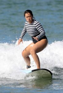 Priscilla Chan in a Black and White Swimsuit