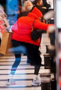 Tayshia Adams in a Red Beanie Hat