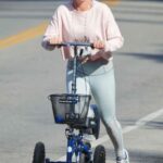 Teddi Mellencamp in a White Cap Riding a Mobility Scooter in Los Angeles 01/10/2021