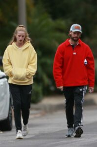 Abby Champion in a Yellow Hoodie