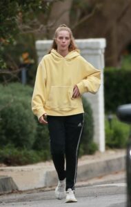 Abby Champion in a Yellow Hoodie