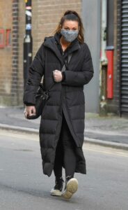 Alison King in a Black Puffer Coat