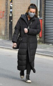 Alison King in a Black Puffer Coat