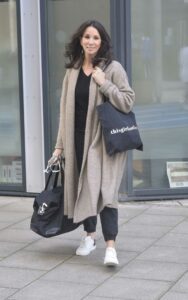 Andrea Mclean in a Beige Cardigan