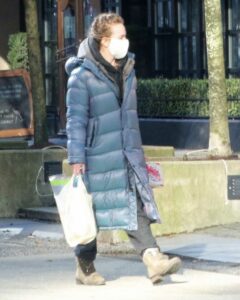 Britt Robertson in a Grey Puffer Coat