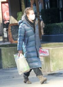 Britt Robertson in a Grey Puffer Coat