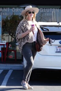 Catherine Sutherland in a Beige Hat