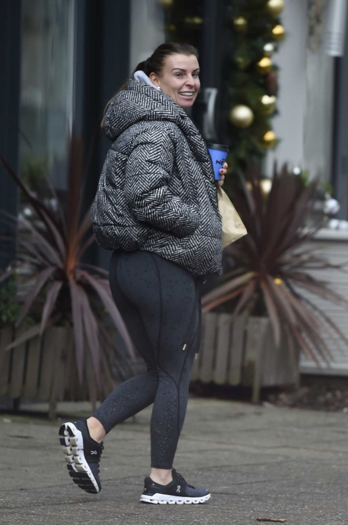 Coleen Rooney in a Black Sneakers