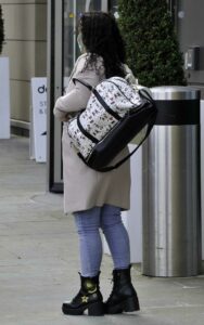 Dani Harmer in a Beige Coat