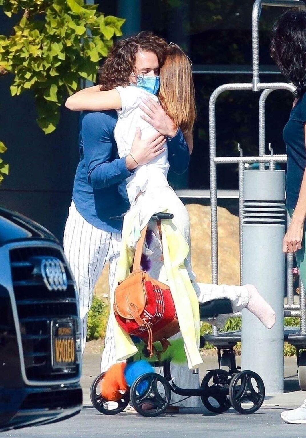 Emma Watson in a White Tee Sharing a Hug with Her Boyfriend Leo