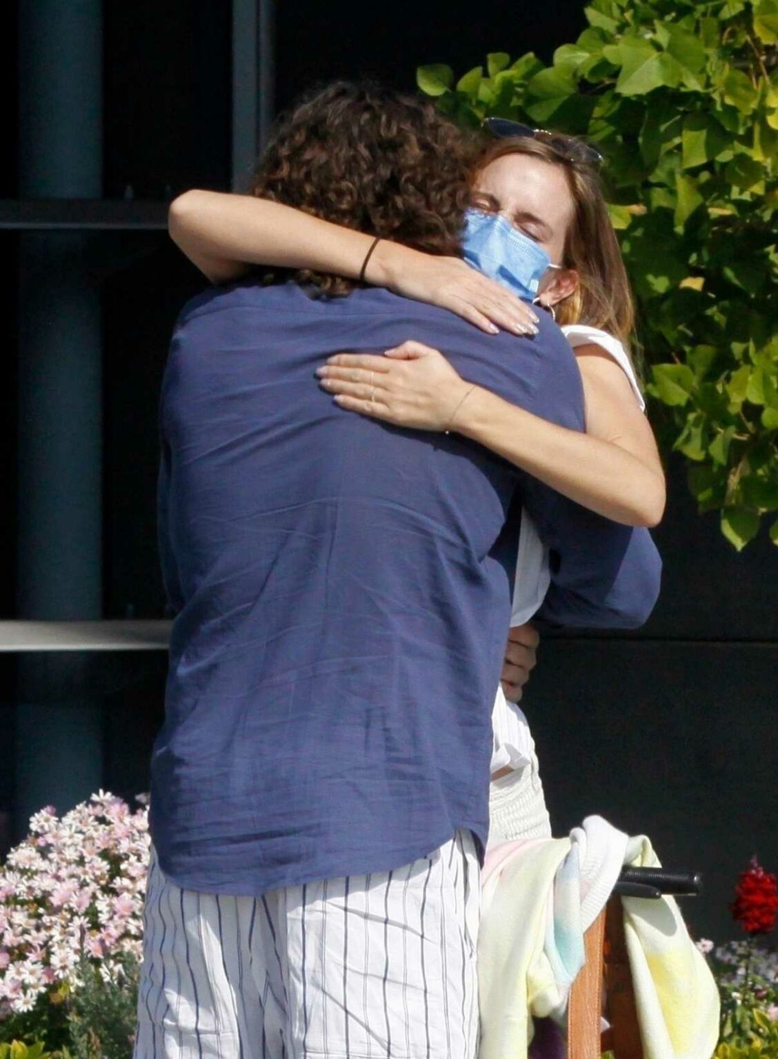 Emma Watson in a White Tee Sharing a Hug with Her Boyfriend Leo