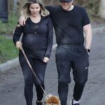 Georgia Kousoulou in a Black Outfit Walks Her Dog in Essex 02/24/2021