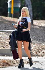 Holly Madison in a Black High Heeled Boots