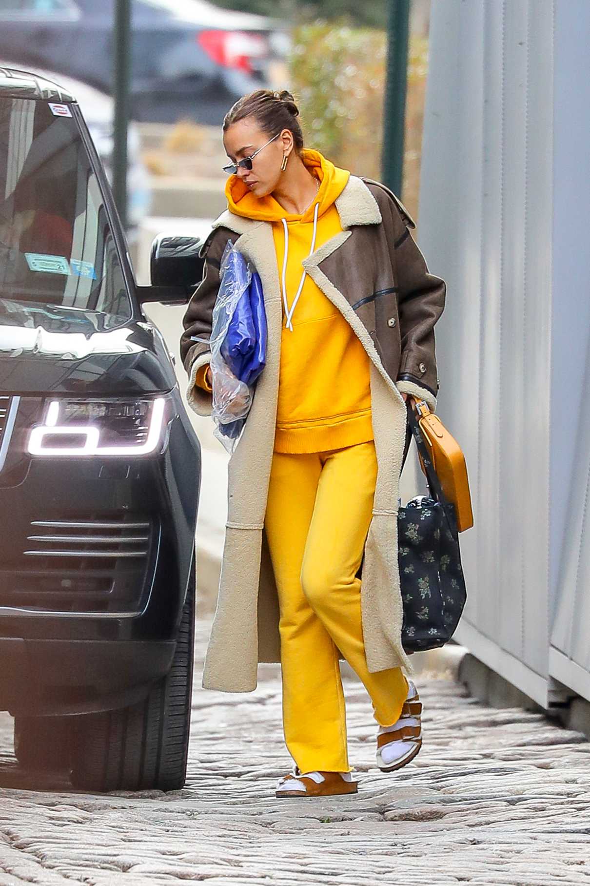 Irina Shayk in a Yellow Sweatsuit Was Spotted Out in New York 02/26 ...