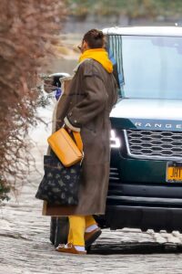 Irina Shayk in a Yellow Sweatsuit