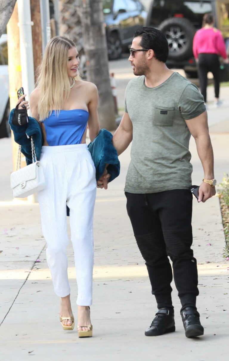 Joy Corrigan in a White Pants Was Seen Out with Her Boyfriend in West