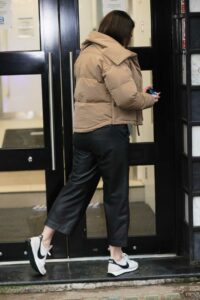 Kelly Brook in a Beige Puffer Jacket