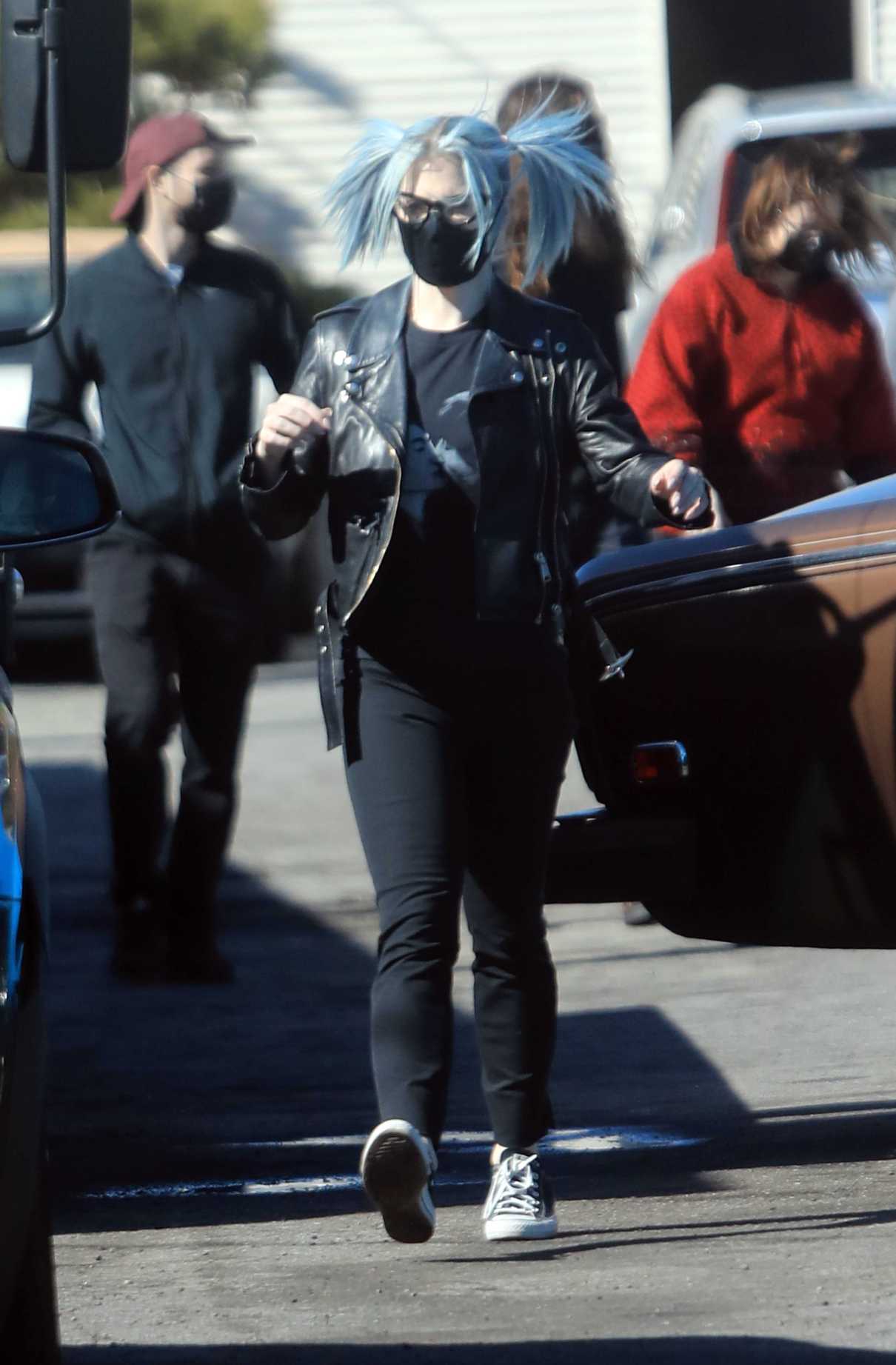 Kelly Osbourne in a Black Leather Jacket