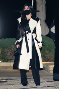 Kourtney Kardashian in a Black and White Leather Coat
