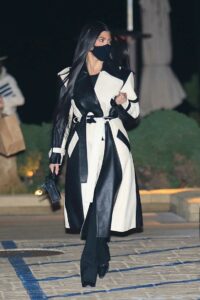 Kourtney Kardashian in a Black and White Leather Coat