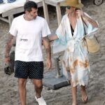 Laeticia Hallyday in a Beige Hat Was Seen Out with Jalil Lespert on the Beach in St. Barths 02/18/2021