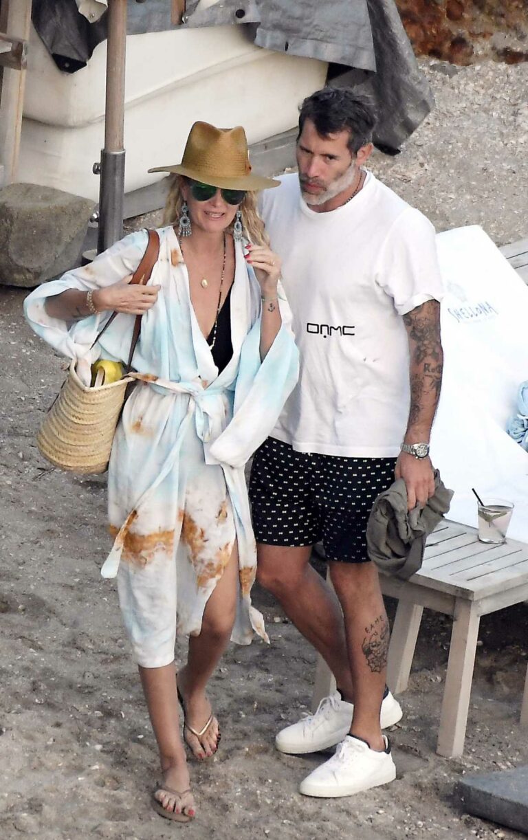 Laeticia Hallyday in a Beige Hat Was Seen Out with Jalil Lespert on the