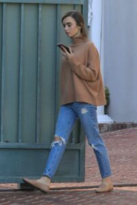 Lily Collins in a Blue Ripped Jeans