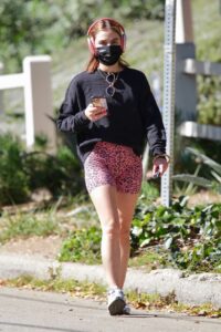 Lucy Hale in a Pink Animal Print Spandex Shorts