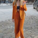Martha Hunt in an Orange Suit Arrives at Jason Wu Fashion Show in New York 02/15/2021
