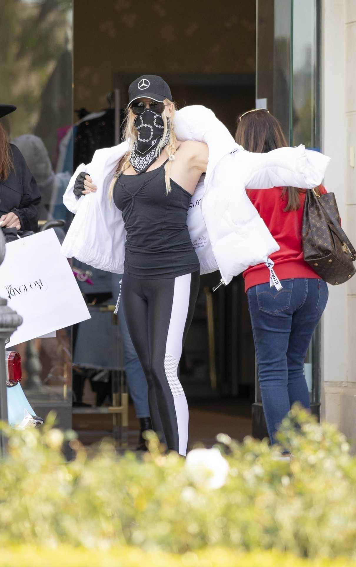 Nicollette Sheridan in a White Puffer Jacket