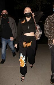 Noah Cyrus in a Black Protective Mask