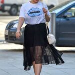 Pandora Christie in a White Tee Leaves the Global Studios in London 02/26/2021
