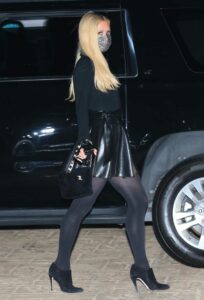 Paris Hilton in a Black Mini Skirt