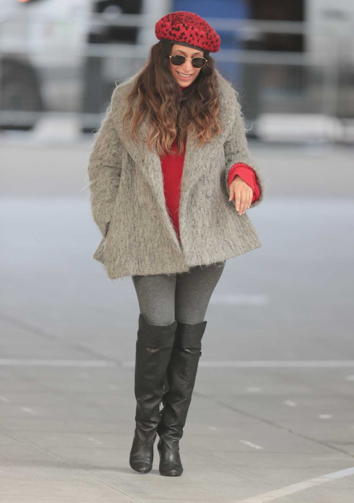 Preeya Kalidas in a Red Beret