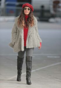 Preeya Kalidas in a Red Beret