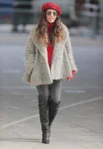 Preeya Kalidas in a Red Beret