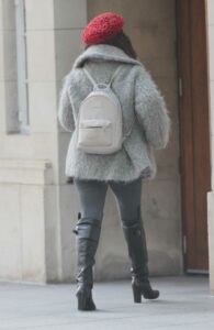 Preeya Kalidas in a Red Beret