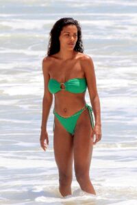 Tina Kunakey in a Green Bikini