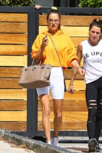 Alessandra Ambrosio in a Yellow Hoodie