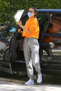 Alessandra Ambrosio in an Orange Hoodie