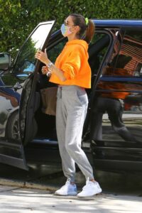 Alessandra Ambrosio in an Orange Hoodie