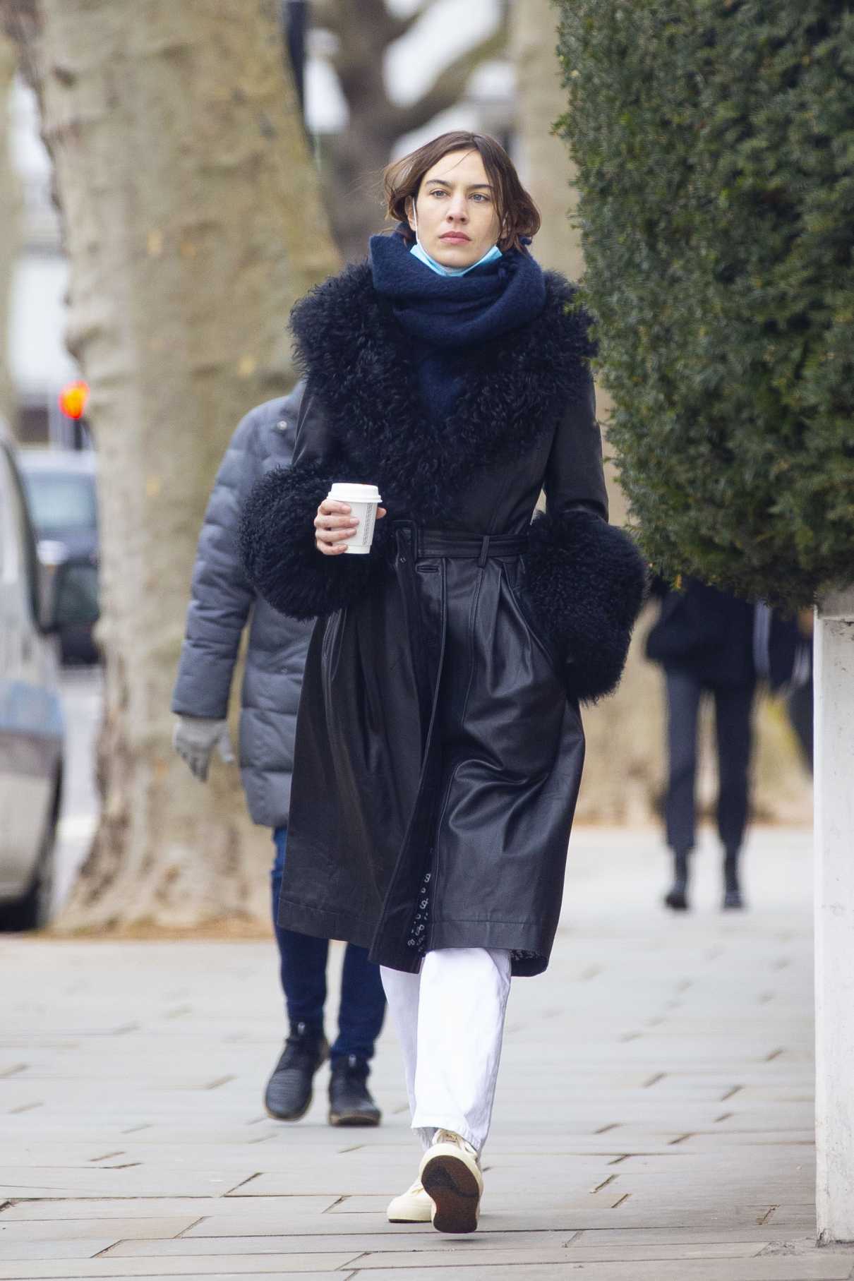 Alexa Chung in a Black Coat Was Seen Out with Boyfriend Orson Fry in ...