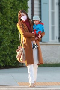 Anne Hathaway in a Tan Coat