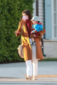 Anne Hathaway in a Tan Coat