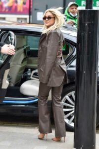 Ashley Roberts in a Brown Leather Suit