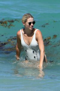 Claire Holt in a White Swimsuit