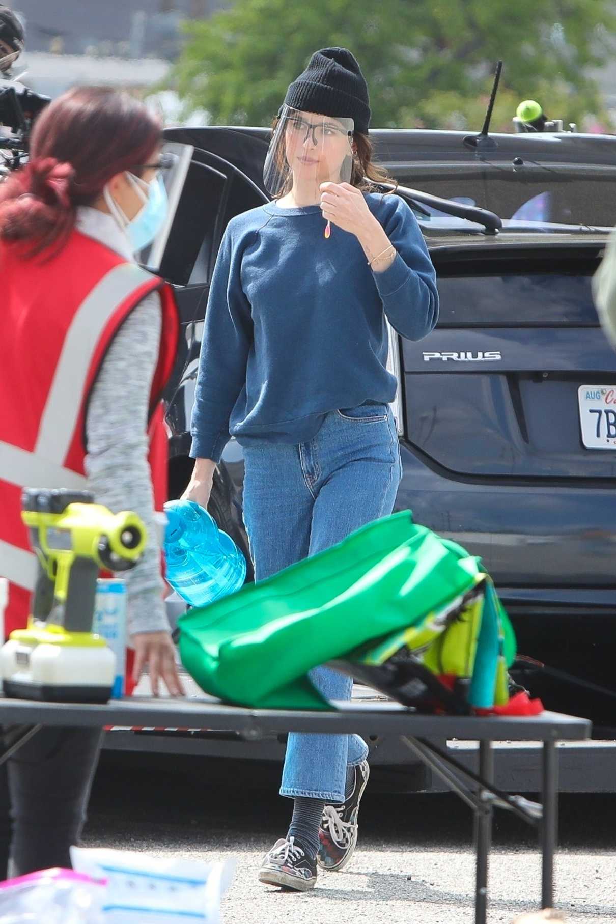 Dakota Johnson in a Blue Sweatshirt