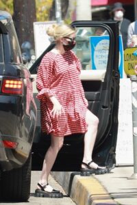 Emma Roberts in a Red Mini Dress