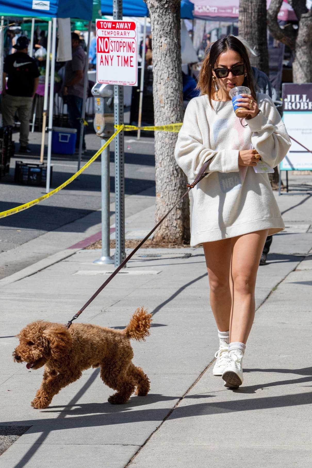 Inanna Sarkis in a White Sweatshirt