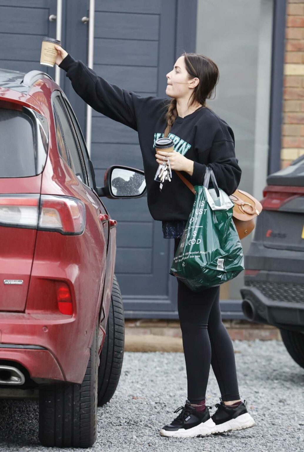 Jacqueline Jossa in a Black Leggings Arrives at Her Home in Essex 03/16